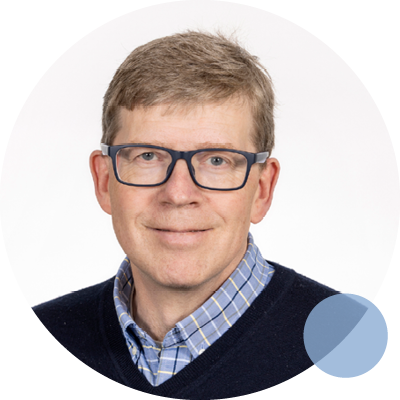 Dr. Edward Petch, a Psychiatrist, is depicted with glasses next to a blue circle, symbolizing his 2020 team of specialists.